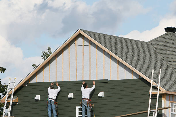 Professional Emergency Siding Repair technician working in Whitsett, NC
